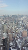 Zdjcie Patryka Zarbskiego pokazywane na spotkaniu - panorama Nowego Jorku.